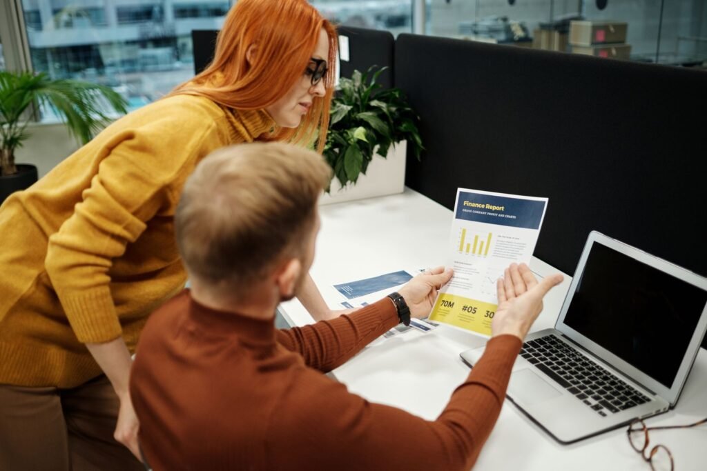 Person reviewing a credit report line by line to dispute an error